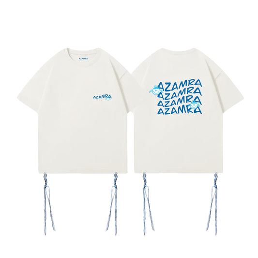 T-shirt tsitsit talith casher blanc cassé avec logo smiley bleu, modèle oversize avec poches intérieures